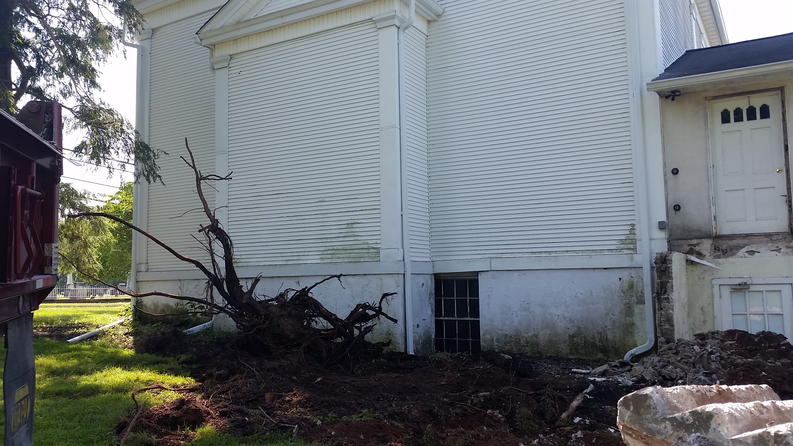 June 25_2018_Removal_of_weeping_cherry_and_shrubs_at_back_of_church